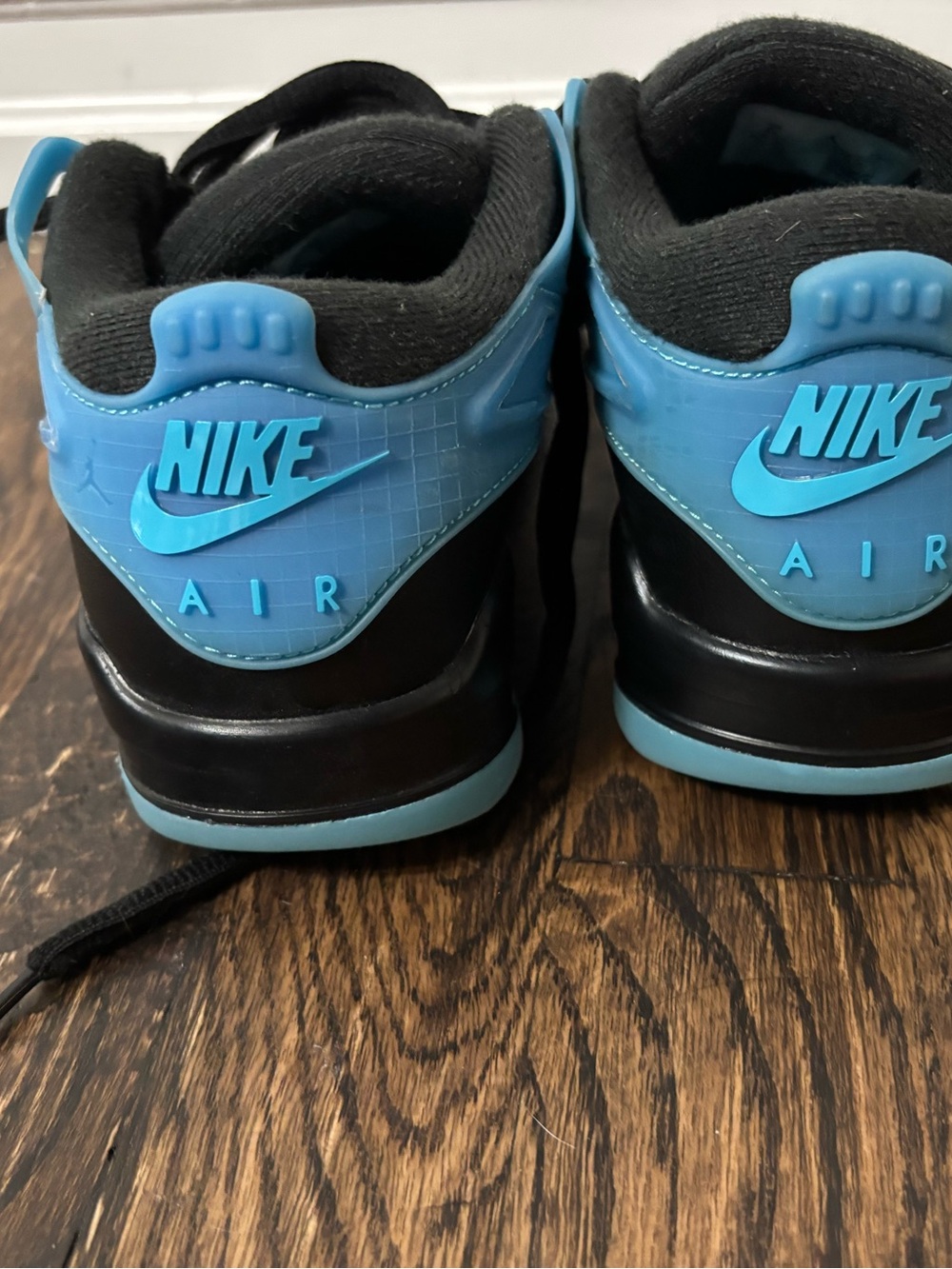 Jordan 4 RM Kids Air Sneakers in Black and Bright Blue - size 4Y
